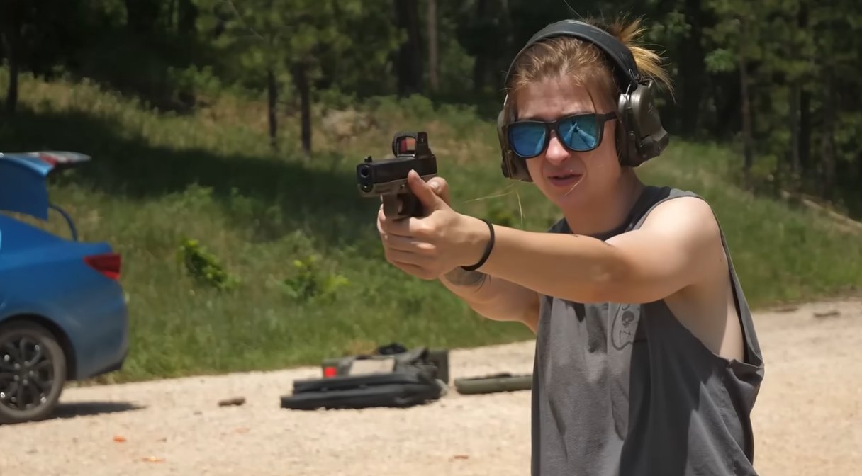 Boondock Ballistician shooting red dot pistol
