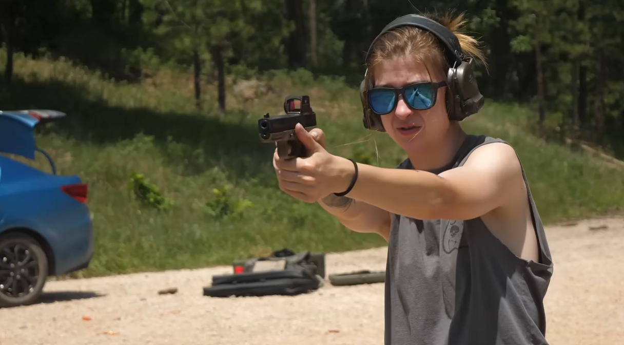 Boondock Ballistician shooting red dot pistol